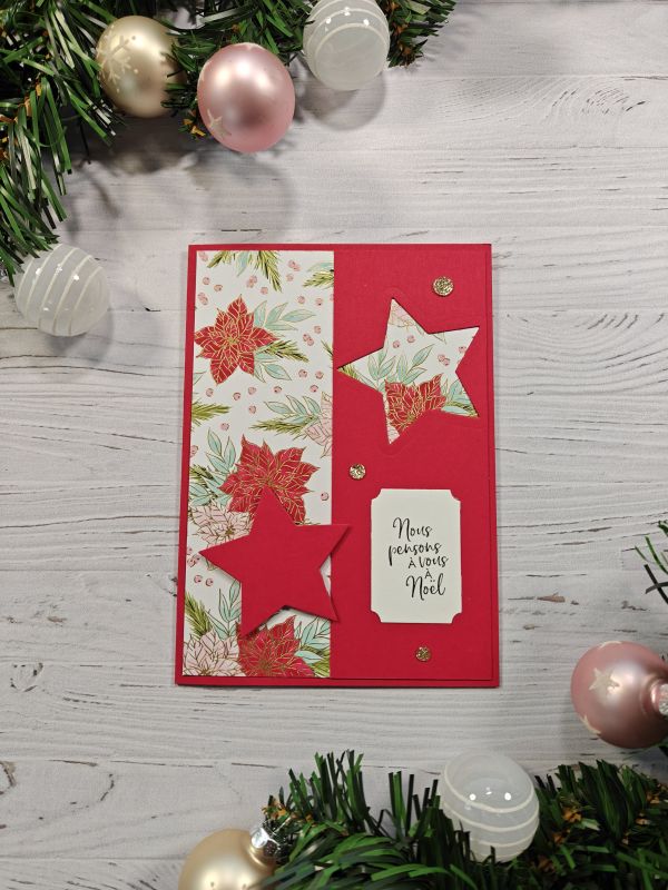 Carte de voeux poinsettia et étoile